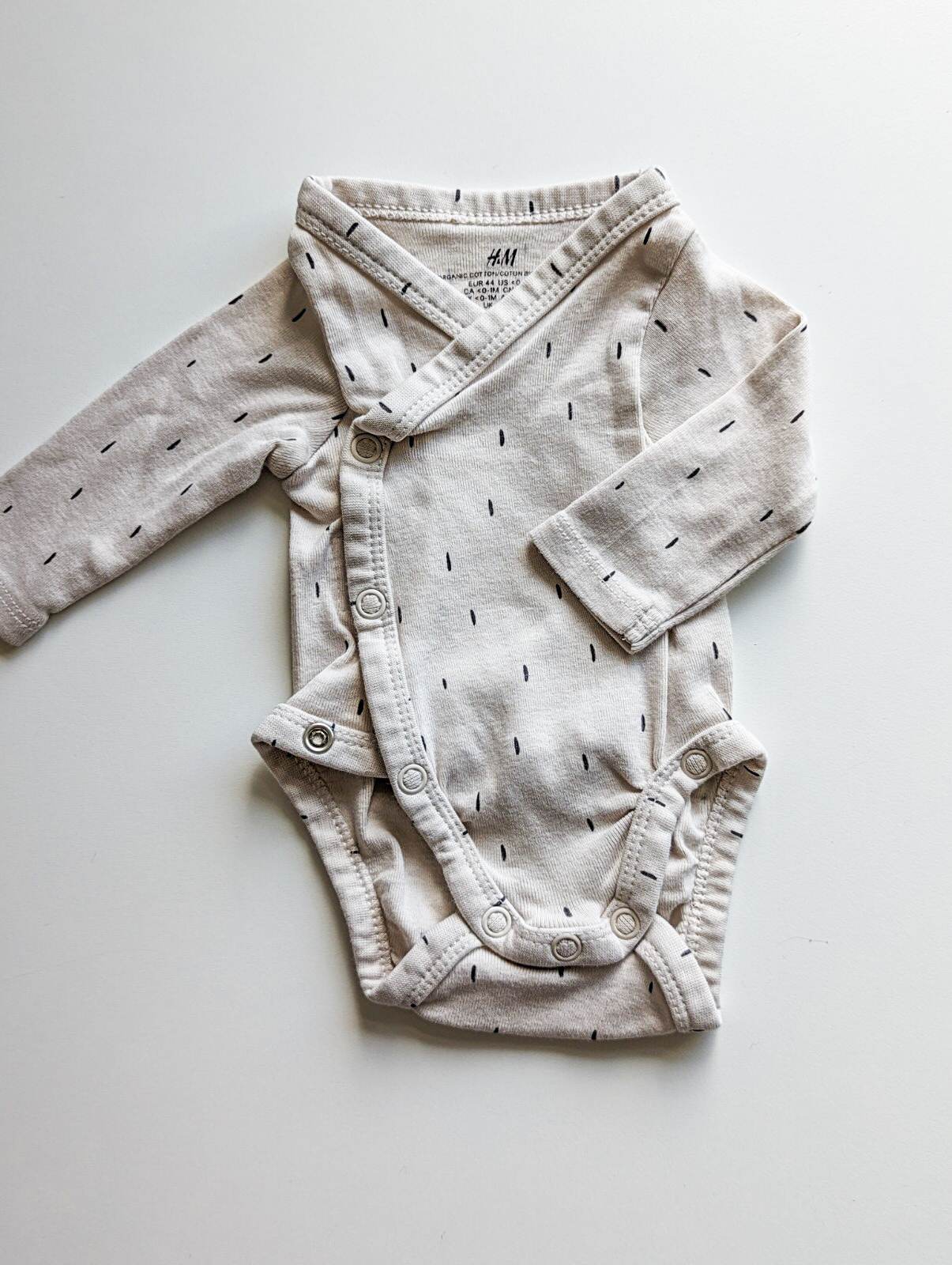 H&M Organic Cotton Long Sleeve Wrap Bodysuit in Cream (Preemie)