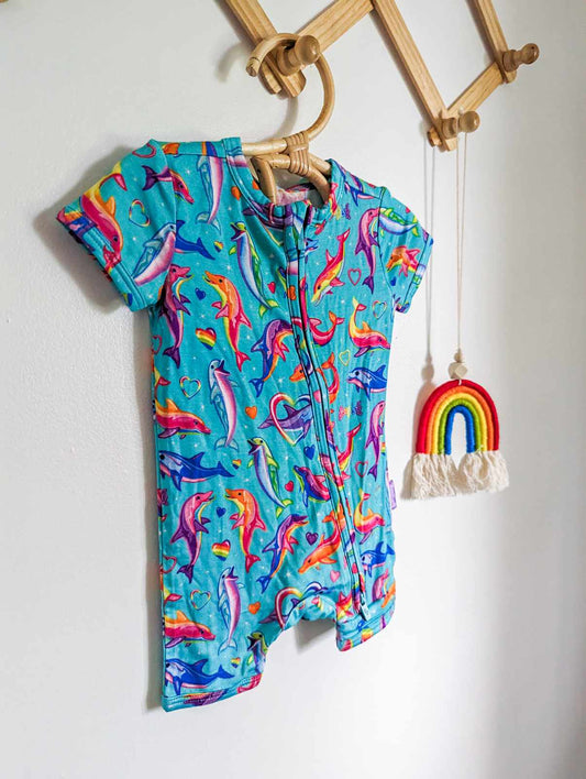 Posh Peanut x Lisa Frank Dancing Dolphins Short Sleeve Romper (0-3)