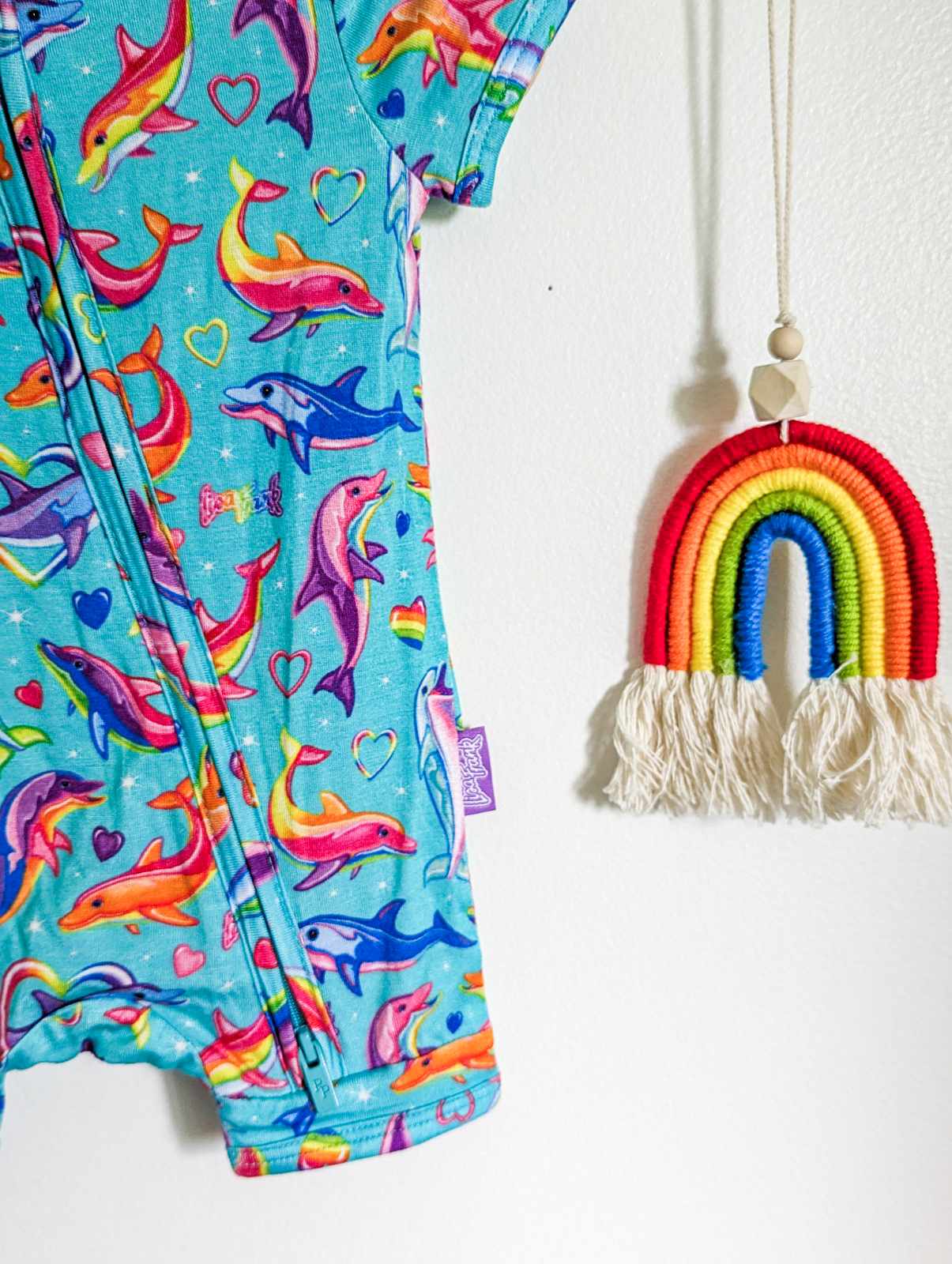 Posh Peanut x Lisa Frank Dancing Dolphins Short Sleeve Romper (0-3)