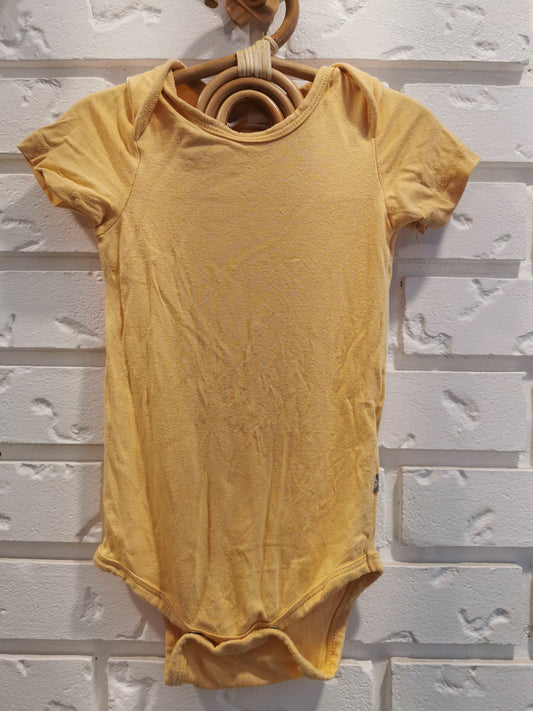 Kyte Baby Long Sleeve Bodysuit in Light Yellow (12-18)