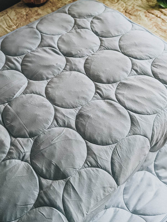 Kate Quinn Organic Cotton Classic Circle Quilt in Ice Blue